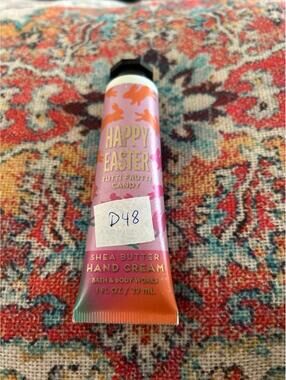 D48  1 Bath and Body Works hand cream 1 oz happy Easter tutti frutti